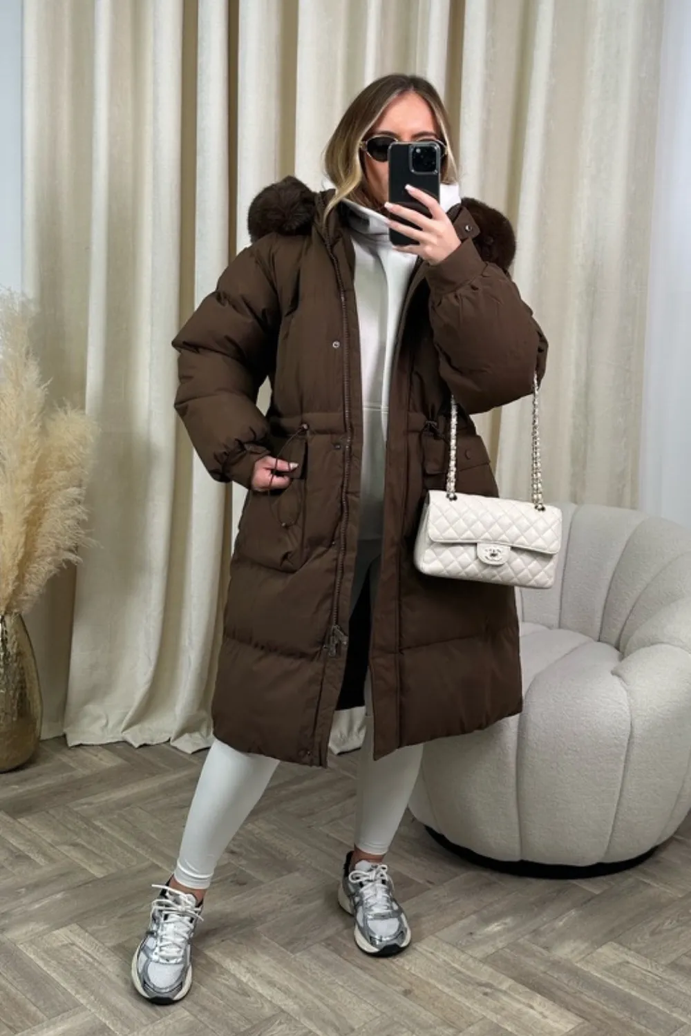 Carrie chocolate long puffer coat with faux fur hood